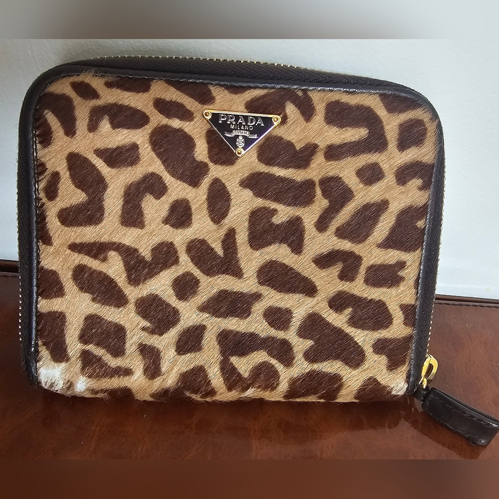 Authentic PRADA leather and calfskin, zippy & snap bifold wallet. Leopard print